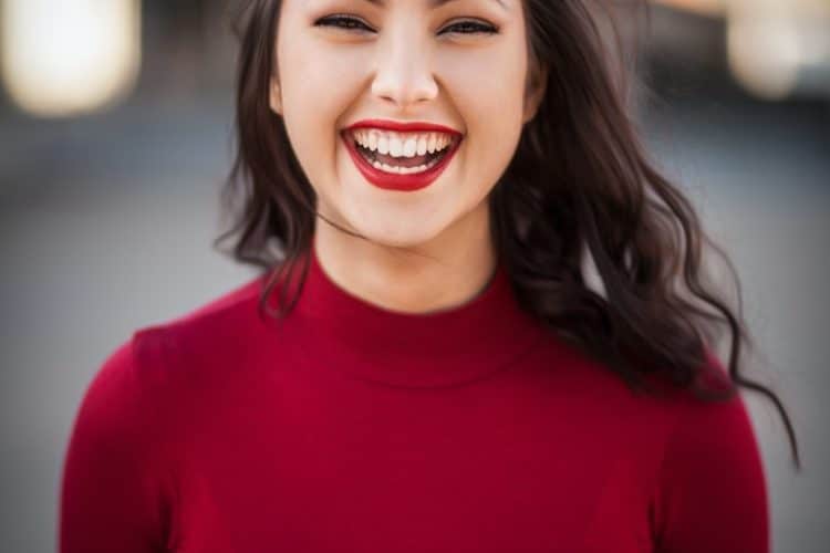 closeup photography of woman smiling
